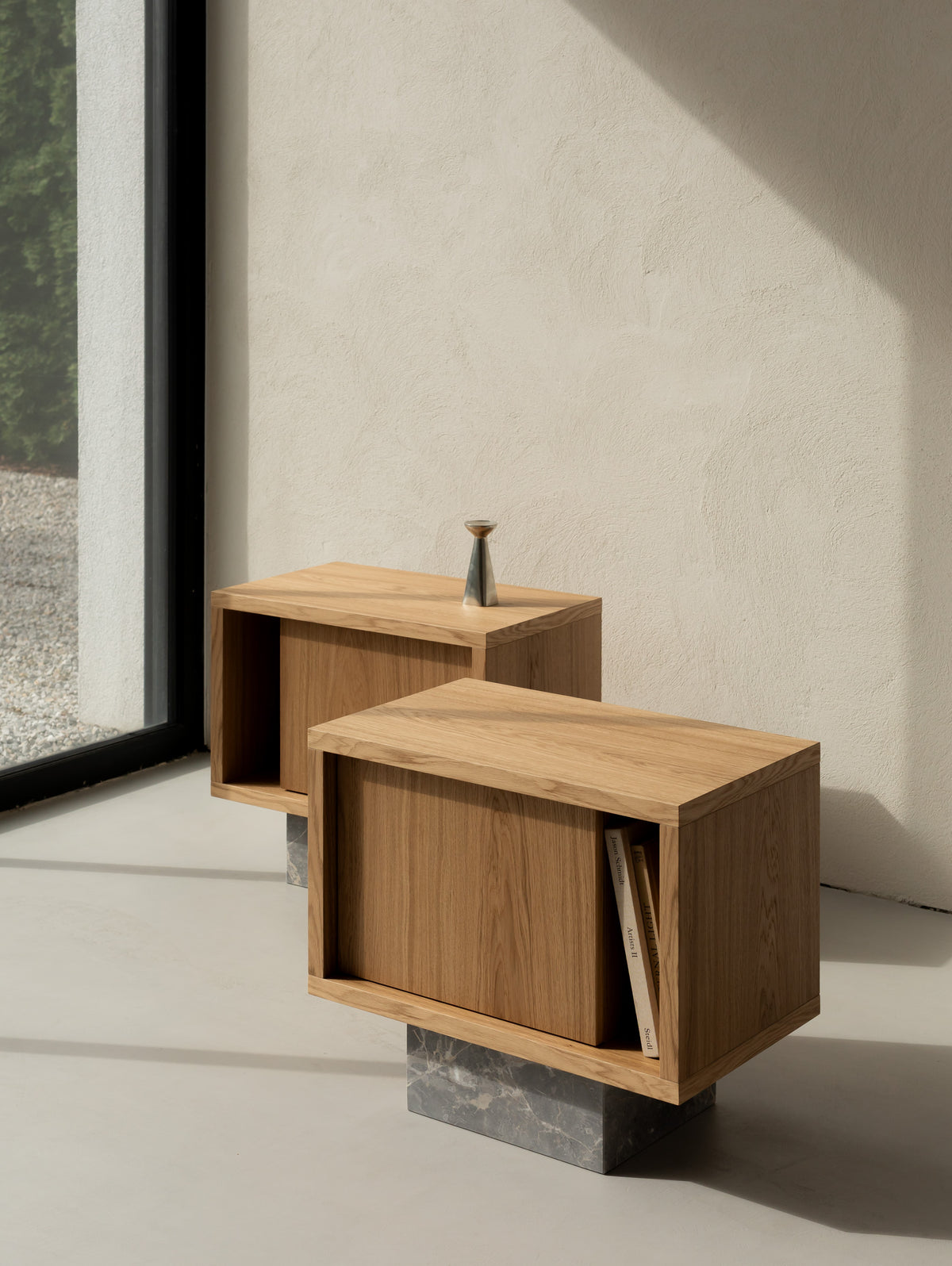 BLOCK Side Table in natural oak with Fior di Bosco marble base, shown as a mirrored left and right pair by a large window.
